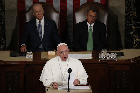 Pope Francis addresses a joint meeting of the U.S. Congress as Vice President Joe Biden (left) and Speaker of the House John Boehner look on in the House of Representatives Chamber at the U.S. Capitol in Washington Sept. 24. (CNS photo/Paul Haring) See POPE-CONGRESS Sept. 24, 2015.