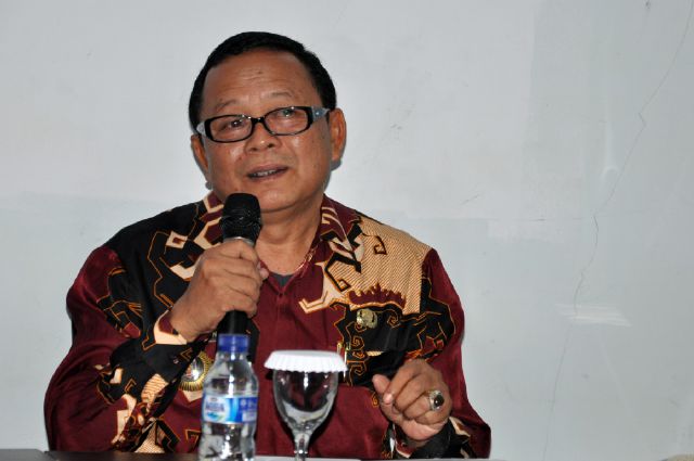 Plt Kadis Kominfo Sumarju Saeni pada Acara Sistem Pendampingan Informasi Desa, Jumat (11/9) di Kampus IBI Dharmajaya Bandar Lampung.