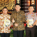 Polda Lampung Luncurkan Buku Bhayangkara Lampung Melintas Badai